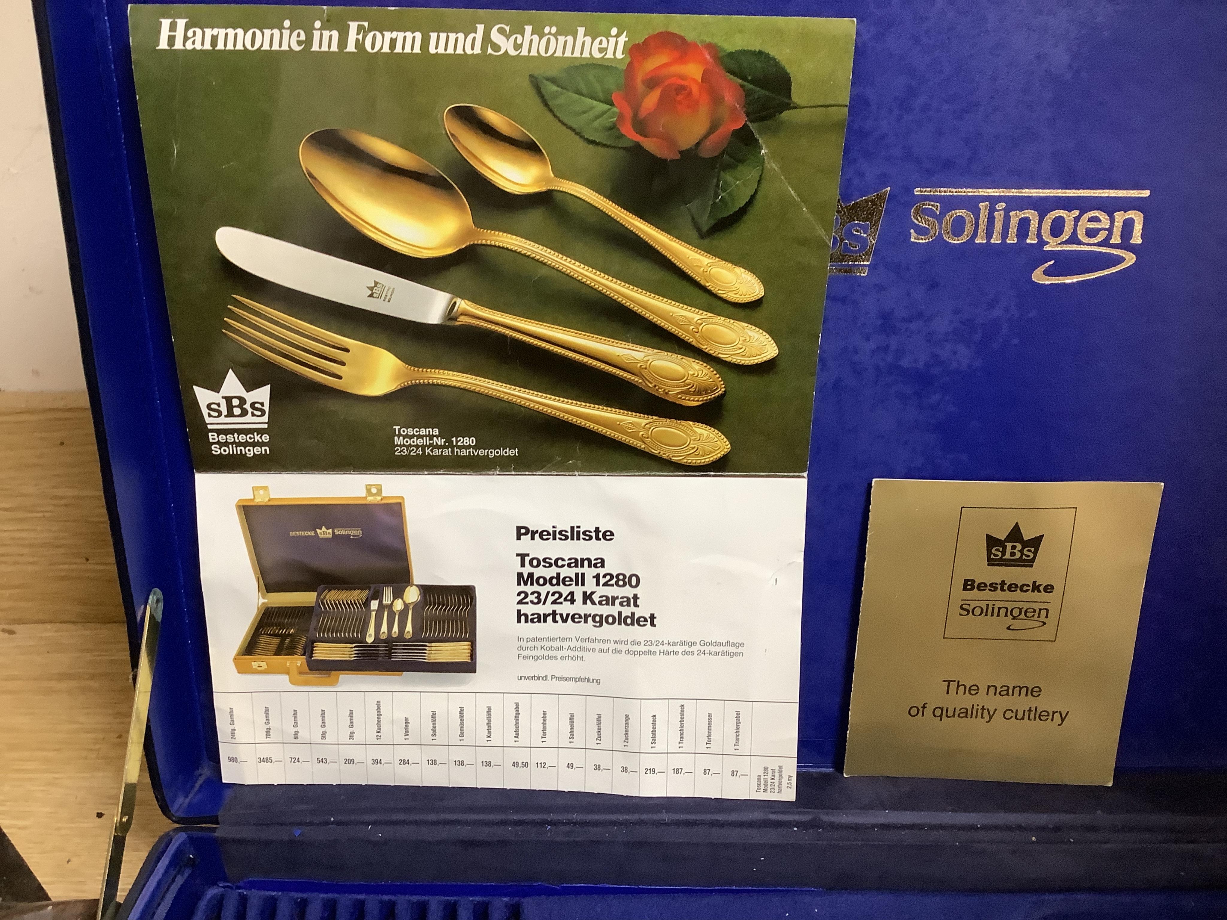 A Bestecke Solingen gold plated canteen of cutlery
